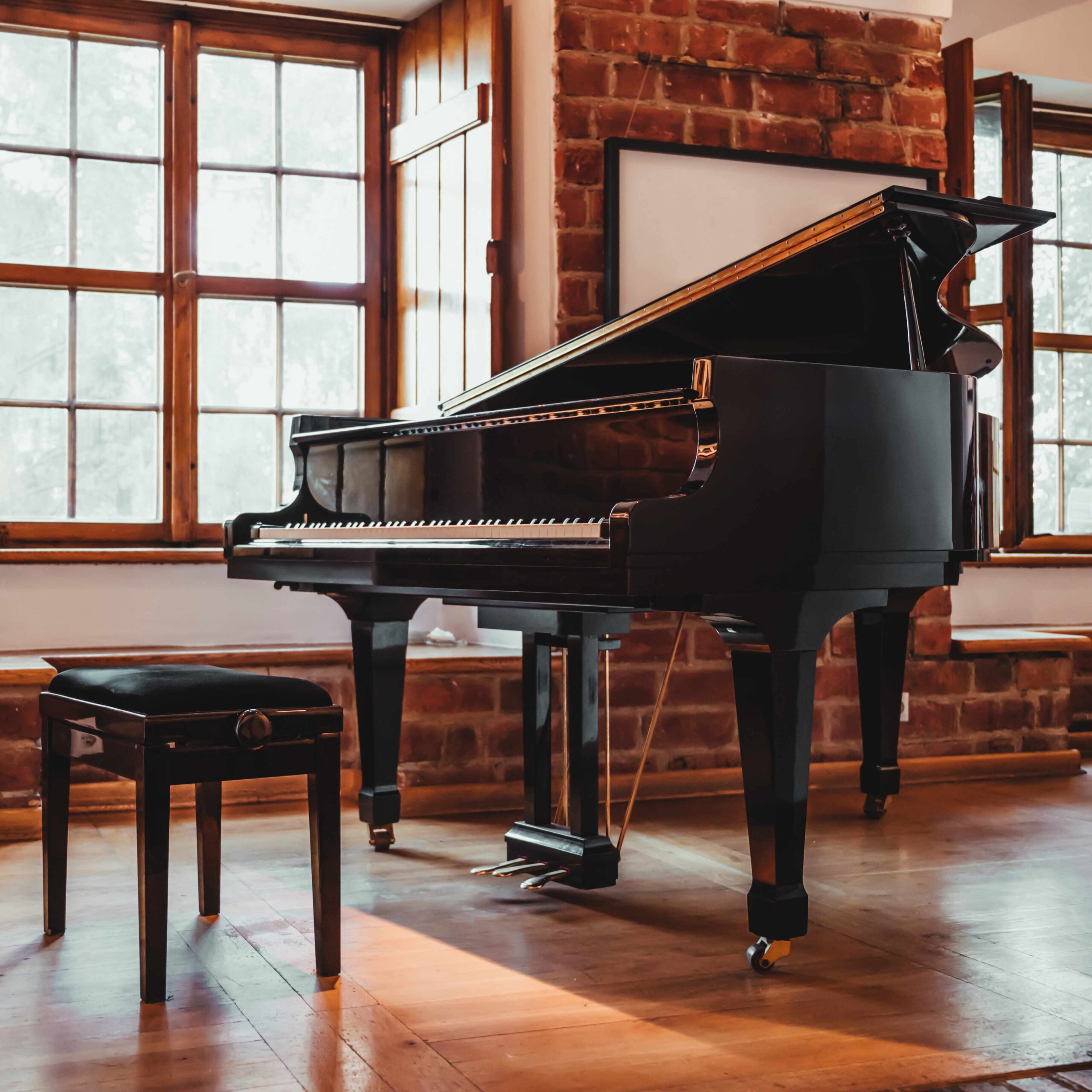 Grand piano in a rustic room